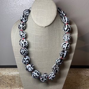 Carved Kukui nut necklace